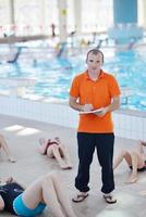 happy childrens at swimming pool photo