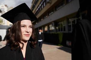 Group of diverse international graduating students celebrating photo