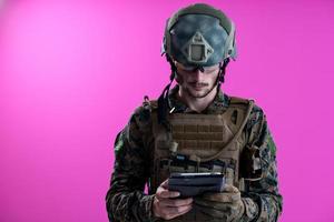 soldier using tablet computer closeup photo
