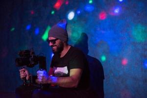 videographer in neon disco party photo