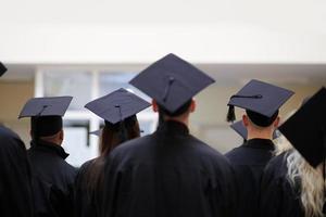 Group of diverse international graduating students celebrating photo