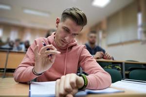 the student uses a smartwatch in math class photo