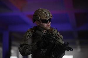 modern warfare soldier in urban environment battlefield photo