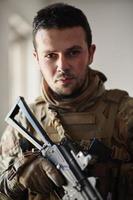 modern warfare soldier portrait in urban environment photo