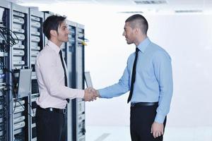 it engineers in network server room photo