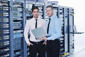 it enineers in network server room photo