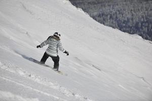 Skiers on mountain photo