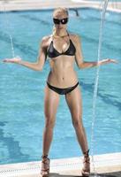 woman relax on swimming pool photo