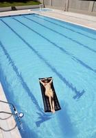 beautiful woman relax on swimming pool photo