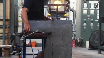 Man doing glass work in a studio video