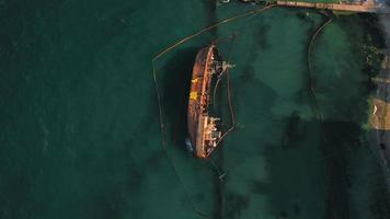 Aerieal view of a wrecked cargo ship on the shore video