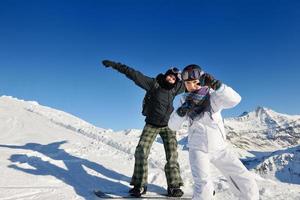 winter portrait of friends at skiing photo