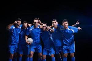 soccer players celebrating victory photo