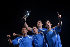 soccer players celebrating victory photo