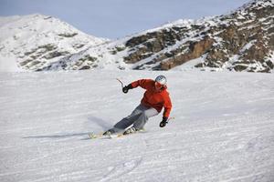 skiing on on now at winter season photo