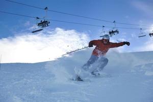 skiing on on now at winter season photo