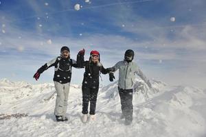 people group on snow at winter season photo