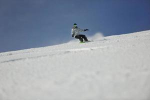 Skiers on mountain photo