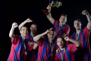 jugadores de fútbol celebrando la victoria foto