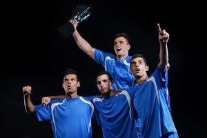 soccer players celebrating victory photo