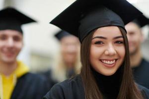 Group of diverse international graduating students celebrating photo