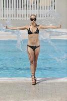 woman relax on swimming pool photo