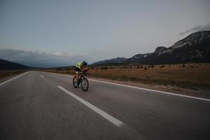 triathlon athlete riding bike photo