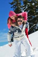 Young Couple In Winter  Snow Scene photo