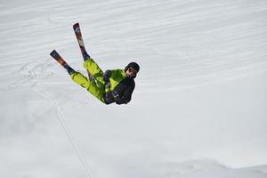 Skiers on mountain photo