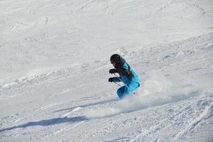 Skiers on mountain photo