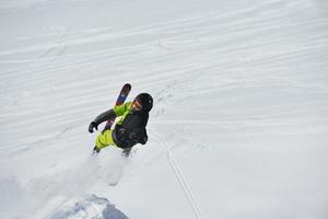 Skiers on mountain photo