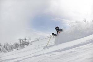 Skier on mountain photo