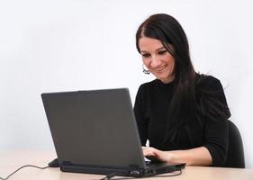 young woman with laptop photo