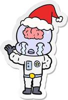 sticker cartoon of a big brain alien crying wearing santa hat vector