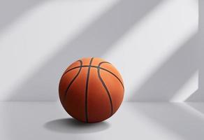 Orange basketball on white room background photo