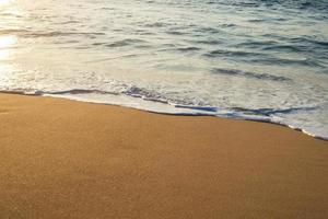 Sea waves on the beach, beautiful soft foam photo