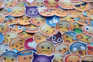 Ternopil, Ukraine - May 8, 2022 Large set of stickers with Emoji yellow faces. Emoji is a pictogram or smiley embedded in text and used in electronic messages and web page photo
