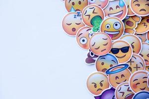 Ternopil, Ukraine - May 8, 2022 Large set of stickers with Emoji yellow faces. Emoji is a pictogram or smiley embedded in text and used in electronic messages and web page photo