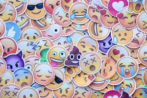 Ternopil, Ukraine - May 8, 2022 Large set of stickers with Emoji yellow faces. Emoji is a pictogram or smiley embedded in text and used in electronic messages and web page photo