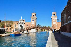 Non touristic part of Venice with empty silence colorful buildings, windows, streets and boats photo