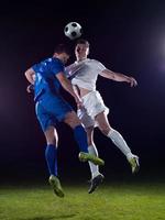 soccer players duel photo