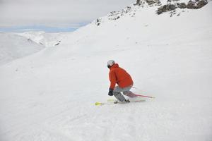 skiing on on now at winter season photo