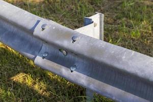 Metal fencing on the highway for safety photo