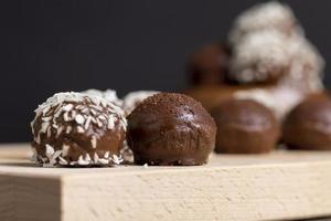 Cocoa and sugar chocolates, close up photo