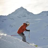 skiing on on now at winter season photo