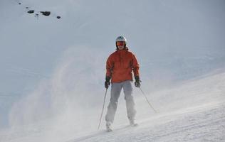 skiing on on now at winter season photo