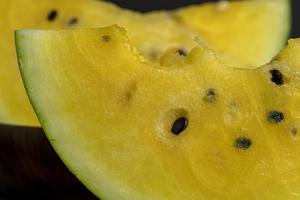 slices of sweet yellow watermelon photo