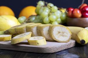 Sliced ripe yellow banana, close up photo