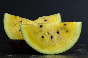 slices of sweet yellow watermelon photo