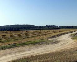 Rural road for cars and transport photo